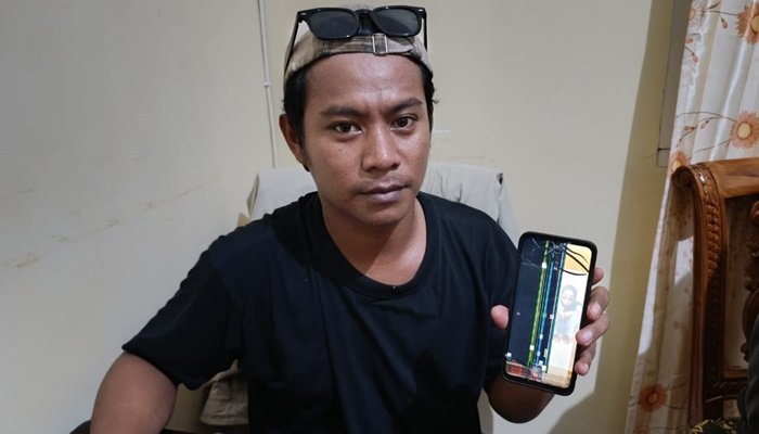 Wartawan RTV Gorontalo, Ridha Yansa yang menjadi korban intimidasi oleh oknum polisi saat meliput demonstrasi. [foto:ist]