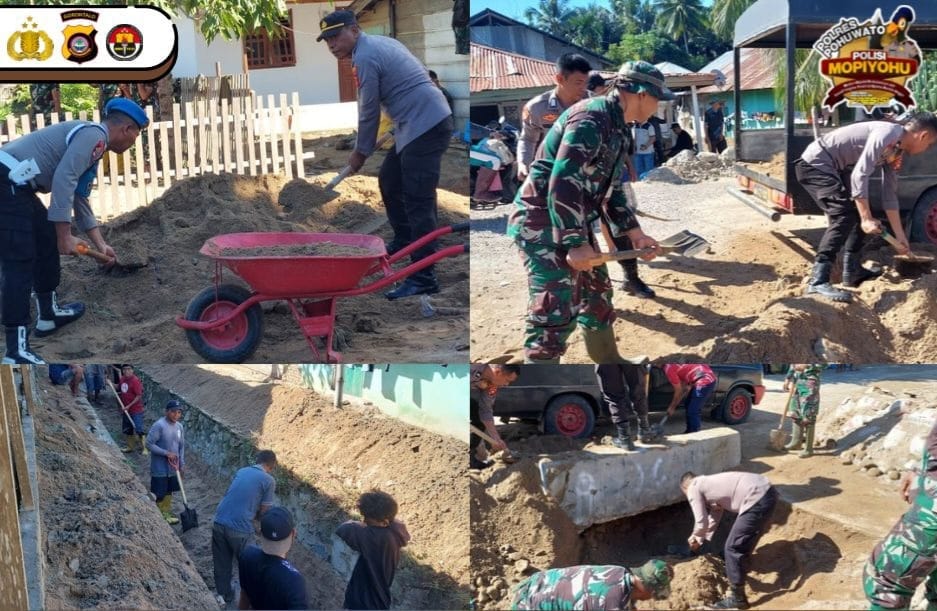 Sinergitas TNI-Polri dan Masyarakat Gelar Kerja Bakti di Desa Soginti. (Foto: Humas Polres Pohuwato)