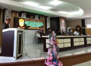 Ketua Panitia Khusus (Pansus) Ranperda, Thamrin Yusuf saat membacakan laporan pada rapat paripurna, Senin (14-7). (Foto: GoTimes)